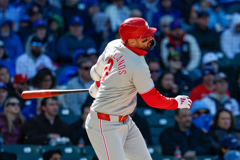 Apr 26, 2025; Chicago, Illinois, USA; Philadelphia Phillies right fielder Nick Castellanos (8) singles against the Chicago Cubs during the fourth inning at Wrigley Field. Mandatory Credit: Kamil Krzaczynski-Imagn Images