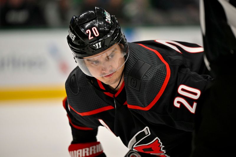 Jan 25, 2023; Dallas, Texas, USA; Carolina Hurricanes center Sebastian Aho (20) waits for the face-off during the first period against the Dallas Stars at the American Airlines Center. Mandatory Credit: Jerome Miron-USA TODAY Sports