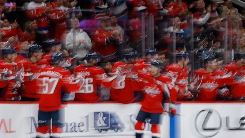 Jan 14, 2025; Washington, District of Columbia, USA; Washington Capitals center Ethen Frank (53) celebrates with teammates after scoring a goal against the Anaheim Ducks in the second period at Capital One Arena. Mandatory Credit: Geoff Burke-Imagn Images