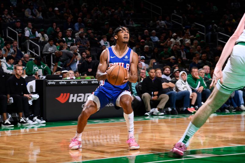 BOSTON, MA - OCTOBER 12: Judah Mintz #33 of the Philadelphia 76ers handles the ball during the game against the Boston Celtics during a NBA Preseason game on October 12, 2024 at TD Garden in Boston, Massachusetts. NOTE TO USER: User expressly acknowledges and agrees that, by downloading and/or using this Photograph, user is consenting to the terms and conditions of the Getty Images License Agreement. Mandatory Copyright Notice: Copyright 2024 NBAE (Photo by Brian Babineau/NBAE via Getty Images)