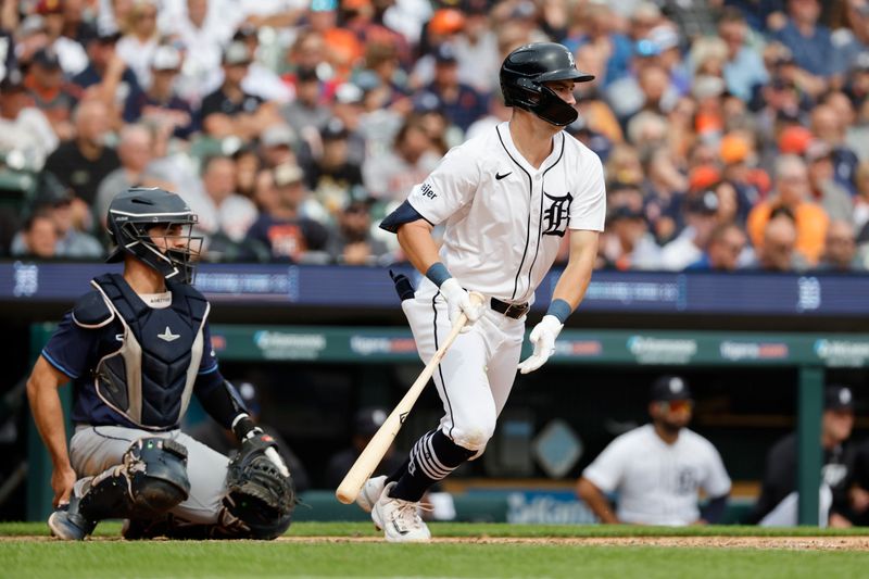 Sep 26, 2024; Detroit, Michigan, USA;  Detroit Tigers shortstop Trey Sweeney (27) hits a single in the fifth inning against the Tampa Bay Rays at Comerica Park. Mandatory Credit: Rick Osentoski-Imagn Images