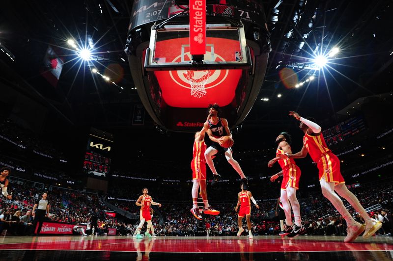 ATLANTA, GA - MARCH 3: Shaedon Sharpe #17 of the Portland Trail Blazers drives to the basket during the game against the Atlanta Hawks on March 3, 2023 at State Farm Arena in Atlanta, Georgia.  NOTE TO USER: User expressly acknowledges and agrees that, by downloading and/or using this Photograph, user is consenting to the terms and conditions of the Getty Images License Agreement. Mandatory Copyright Notice: Copyright 2023 NBAE (Photo by Scott Cunningham/NBAE via Getty Images)