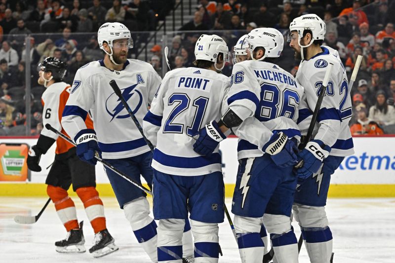 Jan 23, 2024; Philadelphia, Pennsylvania, USA; Tampa Bay Lightning right wing Nikita Kucherov (86) celebrates his goal with teammates against the Philadelphia Flyers during the second period at Wells Fargo Center. Mandatory Credit: Eric Hartline-USA TODAY Sports