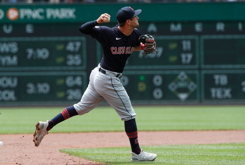 Jul 19, 2023; Pittsburgh, Pennsylvania, USA;  Cleveland Guardians third  baseman Tyler Freeman (2) throws to first base to retire Pittsburgh Pirates left fielder Bryan Reynolds (not pictured) during the first inning at PNC Park. Mandatory Credit: Charles LeClaire-USA TODAY Sports