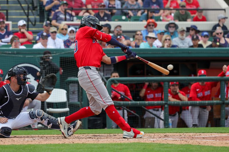 Feb 27, 2025; Lakeland, Florida, USA; Boston Red Sox third baseman Marcelo Mayer (39) hits a three run home run during the fifth inning against the Detroit Tigers at Publix Field at Joker Marchant Stadium. Mandatory Credit: Mike Watters-Imagn Images