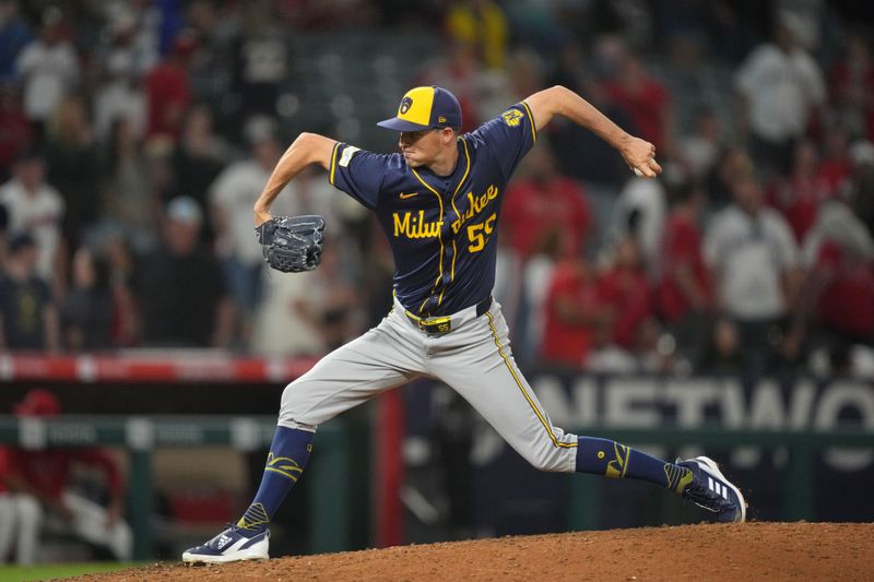 Jun 17, 2024; Anaheim, California, USA; Milwaukee Brewers relief pitcher Hoby Milner (55) throws in the seventh inning against the Los Angeles Angels at Angel Stadium. Mandatory Credit: Kirby Lee-USA TODAY Sports