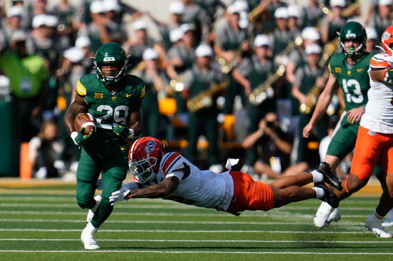 Oct 26, 2024; Waco, Texas, USA;  Baylor Bears running back Richard Reese (29) runs the ball against the Oklahoma State Cowboys during the first half at McLane Stadium. Mandatory Credit: Chris Jones-Imagn Images