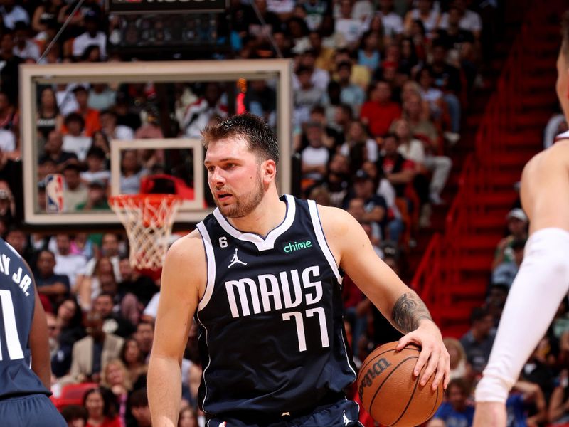 MIAMI, FL - APRIL 1: Luka Doncic #77 of the Dallas Mavericks handles the ball during the game against the Miami Heat on April 1, 2023 at Miami-Dade Arena in Miami, Florida. NOTE TO USER: User expressly acknowledges and agrees that, by downloading and or using this Photograph, user is consenting to the terms and conditions of the Getty Images License Agreement. Mandatory Copyright Notice: Copyright 2023 NBAE (Photo by Issac Baldizon/NBAE via Getty Images)