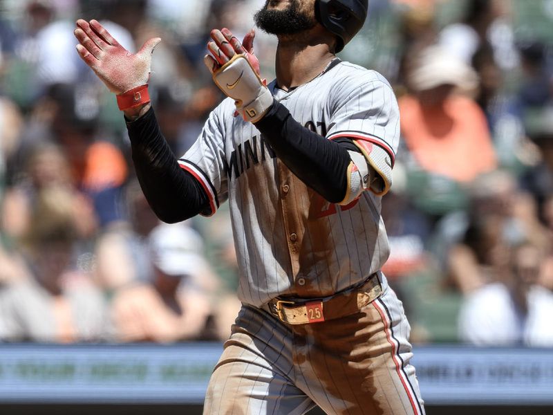 Jun 28, 2025; Detroit, Michigan, USA;  Minnesota Twins designated hitter Byron Buxton (25) celebrates at home plate after hitting a two-run home run against the Detroit Tigers in the third inning at Comerica Park. Mandatory Credit: Lon Horwedel-Imagn Images
