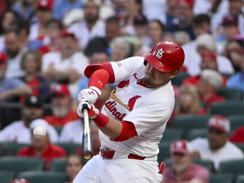 Jun 10, 2025; St. Louis, Missouri, USA;  St. Louis Cardinals second baseman Nolan Gorman (16) hits a three run home run against the Toronto Blue Jays during the fourth inning at Busch Stadium. Mandatory Credit: Jeff Curry-Imagn Images