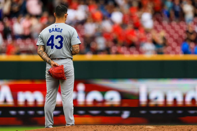 May 26, 2024; Cincinnati, Ohio, USA; Los Angeles Dodgers relief pitcher Anthony Banda (43) stands on the field during the singing of God Bless America in the seventh inning in the game against the Cincinnati Reds at Great American Ball Park. Mandatory Credit: Katie Stratman-USA TODAY Sports