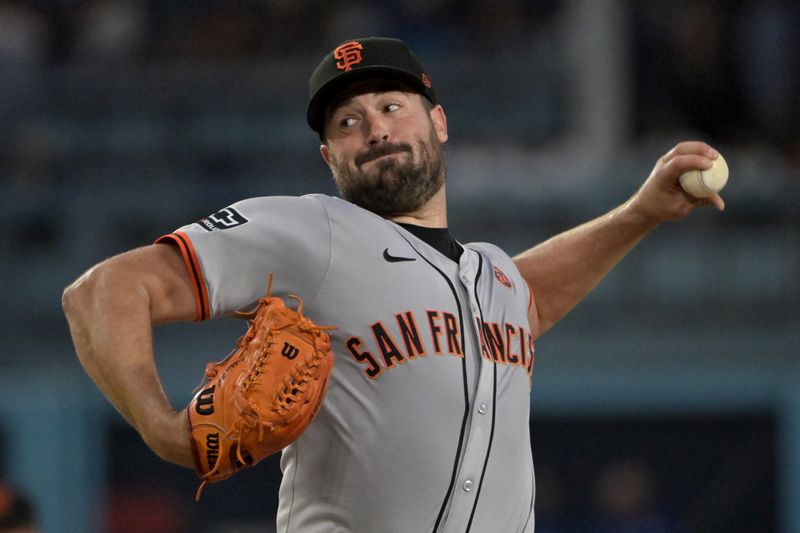 Jul 24, 2024; Los Angeles, California, USA;  San Francisco Giants starting pitcher Robbie Ray (38) delivers to the plate in the third inning against the Los Angeles Dodgers at Dodger Stadium. Mandatory Credit: Jayne Kamin-Oncea-USA TODAY Sports