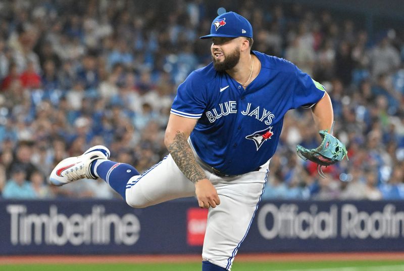 Jul 29, 2023; Toronto, Ontario, CAN; Toronto Blue Jays starting pitcher Alek Manoah (6) delivers a pitch against the Los Angeles Angels in the first inning at Rogers Centre. Mandatory Credit: Dan Hamilton-USA TODAY Sports