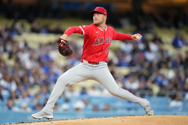 Mar 25, 2024; Los Angeles, California, USA; Los Angeles Angels starting pitcher Reid Detmers (48) throws against the Los Angeles Dodgers in the third inning at Dodger Stadium. Mandatory Credit: Kirby Lee-USA TODAY Sports