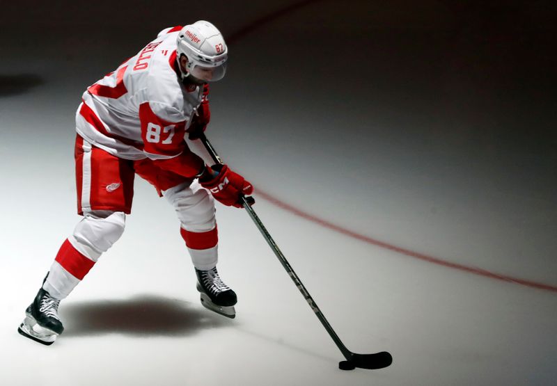 Oct 1, 2024; Pittsburgh, Pennsylvania, USA;  Detroit Red Wings defenseman Tory Dello (87) takes the ice to warm up against the Pittsburgh Penguins at PPG Paints Arena. Mandatory Credit: Charles LeClaire-Imagn Images