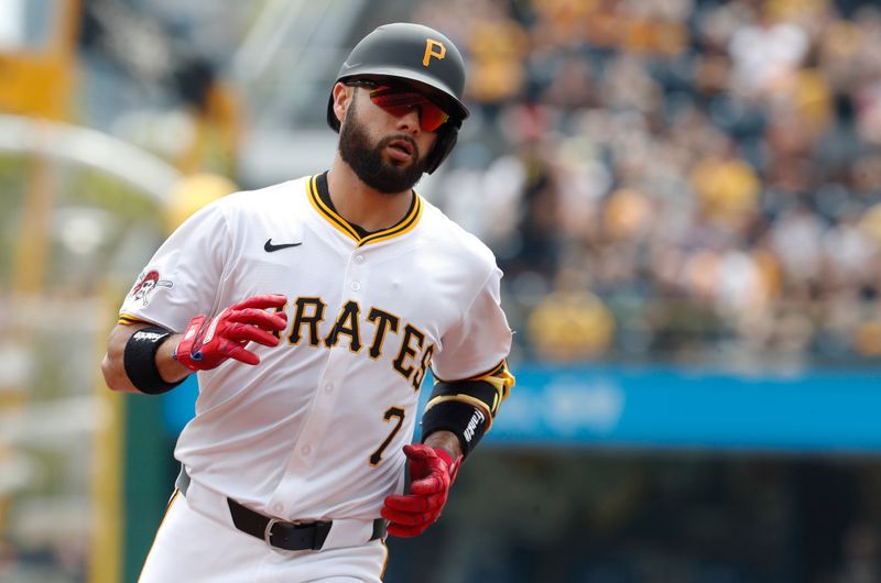 Aug 17, 2024; Pittsburgh, Pennsylvania, USA;  Pittsburgh Pirates shortstop Isiah Kiner-Falefa (7) circles the bases on a solo home run against the Seattle Mariners during the first inning at PNC Park. Mandatory Credit: Charles LeClaire-USA TODAY Sports