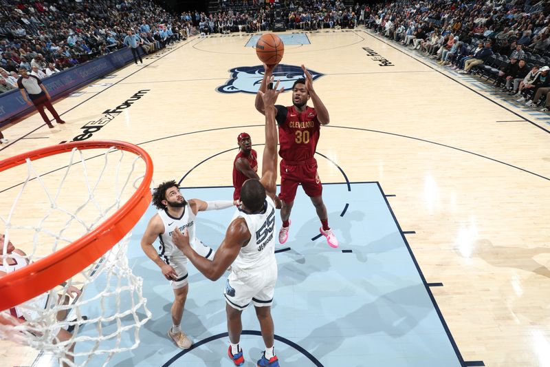 MEMPHIS, TN - FEBRUARY 1:  Damian Jones #30 of the Cleveland Cavaliers shoots the ball during the game  against the Memphis Grizzlies on February 1, 2024 at FedExForum in Memphis, Tennessee. NOTE TO USER: User expressly acknowledges and agrees that, by downloading and or using this photograph, User is consenting to the terms and conditions of the Getty Images License Agreement. Mandatory Copyright Notice: Copyright 2024 NBAE (Photo by Joe Murphy/NBAE via Getty Images)