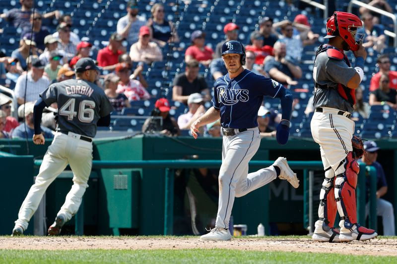 Apr 5, 2023; Washington, District of Columbia, USA; Tampa Bay Rays third baseman Taylor Walls (6) scores on an RBI single by Rays center fielder Jose Siri (not pictured) against the Washington Nationals during the sixth inning at Nationals Park. Mandatory Credit: Geoff Burke-USA TODAY Sports