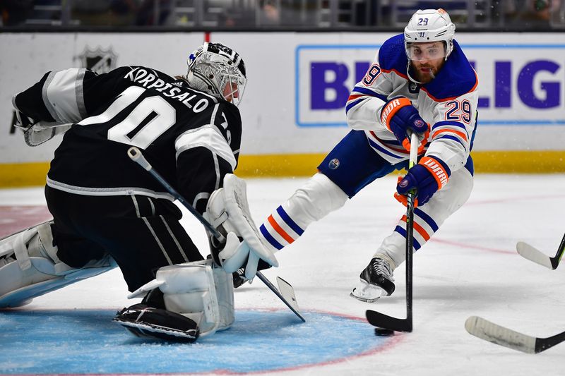 Apr 29, 2023; Los Angeles, California, USA; Edmonton Oilers center Leon Draisaitl (29) moves in for a shot against Los Angeles Kings goaltender Joonas Korpisalo (70) during the third period in game six of the first round of the 2023 Stanley Cup Playoffs at Crypto.com Arena. Mandatory Credit: Gary A. Vasquez-USA TODAY Sports