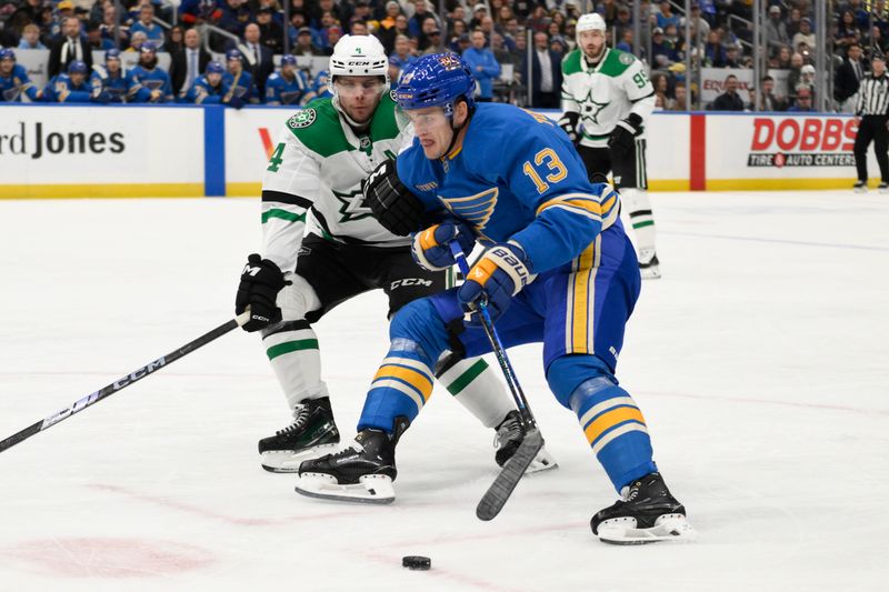 Jan 25, 2025; St. Louis, Missouri, USA; Dallas Stars defenseman Miro Heiskanen (4) pressures St. Louis Blues right wing Alexey Toropchenko (13) during the second period at Enterprise Center. Mandatory Credit: Jeff Le-Imagn Images