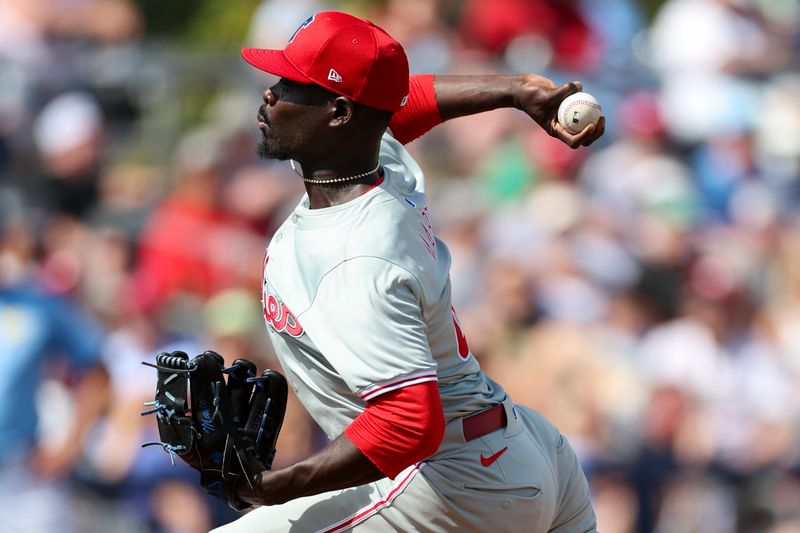 Mar 7, 2024; Port Charlotte, Florida, USA;  Philadelphia Phillies relief pitcher Yunior Marte (43) throws a pitch against the Tampa Bay Rays in the fifth inning at Charlotte Sports Park. Mandatory Credit: Nathan Ray Seebeck-USA TODAY Sports