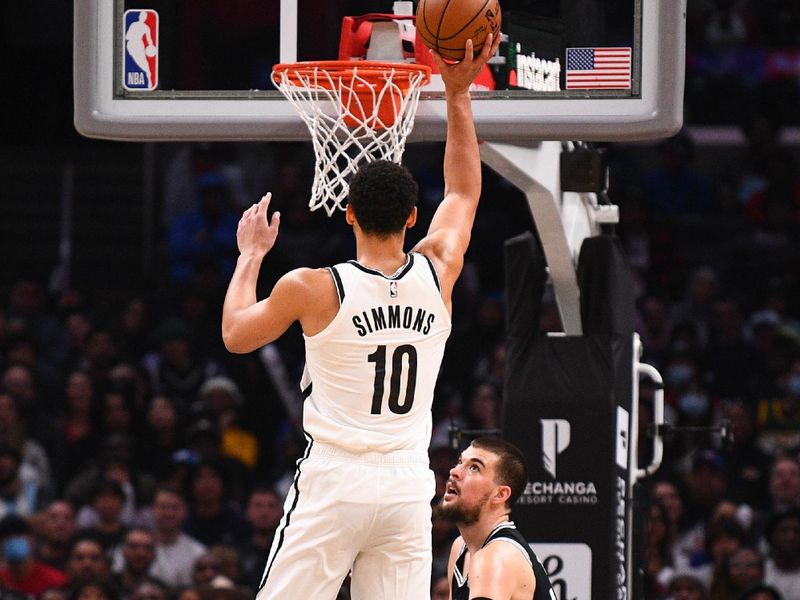 LOS ANGELES, CA - NOVEMBER 12: Brooklyn Nets Guard Ben Simmons (10) shoots over Los Angeles Clippers Center Ivica Zubac (40) during a NBA game between the Brooklyn Nets and the Los Angeles Clippers on November 12, 2022 at Crypto.com Arena in Los Angeles, CA. (Photo by Brian Rothmuller/Icon Sportswire via Getty Images)