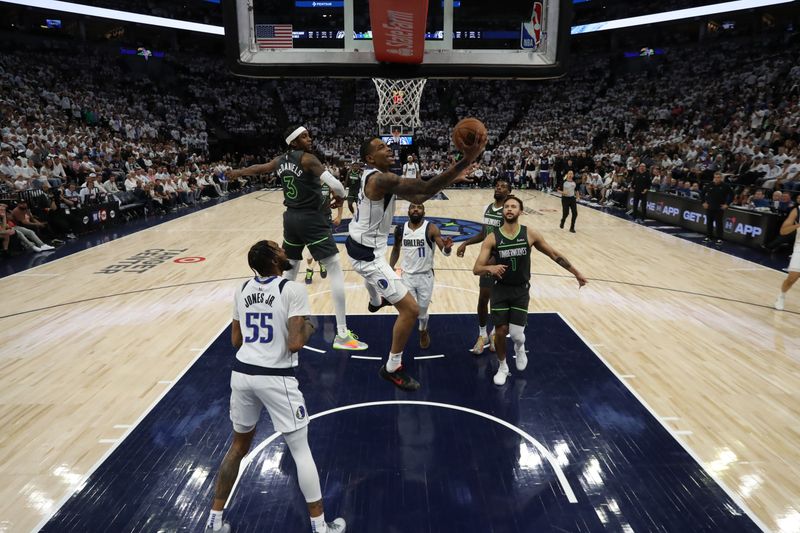 MINNEAPOLIS, MN - MAY 30: PJ Washington #25 of the Dallas Mavericks drives to the basket during the game against the Minnesota Timberwolves during Game 5 of the Western Conference Finals of the 2024 NBA Playoffs on May 30, 2024 at Target Center in Minneapolis, Minnesota. NOTE TO USER: User expressly acknowledges and agrees that, by downloading and or using this Photograph, user is consenting to the terms and conditions of the Getty Images License Agreement. Mandatory Copyright Notice: Copyright 2024 NBAE (Photo by Jordan Johnson/NBAE via Getty Images)