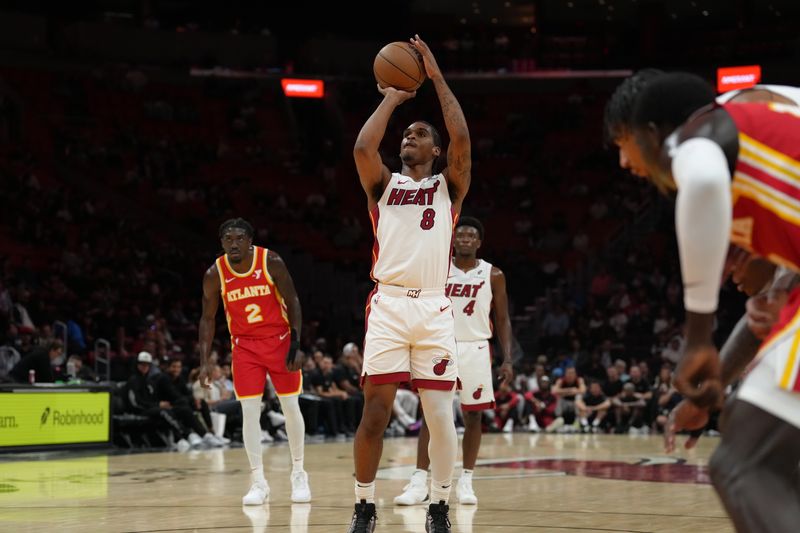 MIAMI, FL - OCTOBER 16:  Josh Christopher #8 of the Miami Heat shoots a free throw during the game against the Atlanta Hawks during a preseason game on October 16, 2024 at Kaseya Center in Miami, Florida. NOTE TO USER: User expressly acknowledges and agrees that, by downloading and or using this Photograph, user is consenting to the terms and conditions of the Getty Images License Agreement. Mandatory Copyright Notice: Copyright 2024 NBAE (Photo by Eric Espada/NBAE via Getty Images)