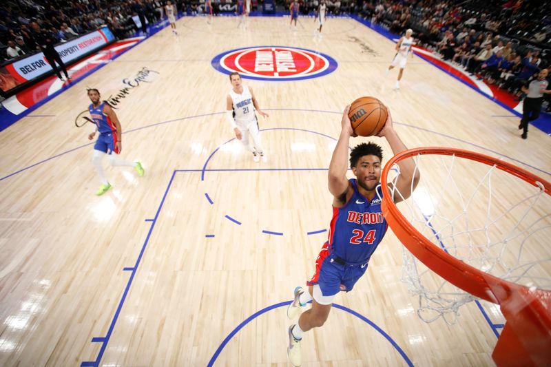 DETROIT, MI - FEBRUARY 24:  Quentin Grimes #24 of the Detroit Pistons goes to the basket during the game on February 24, 2024 at Little Caesars Arena in Detroit, Michigan. NOTE TO USER: User expressly acknowledges and agrees that, by downloading and/or using this photograph, User is consenting to the terms and conditions of the Getty Images License Agreement. Mandatory Copyright Notice: Copyright 2024 NBAE (Photo by Brian Sevald/NBAE via Getty Images)