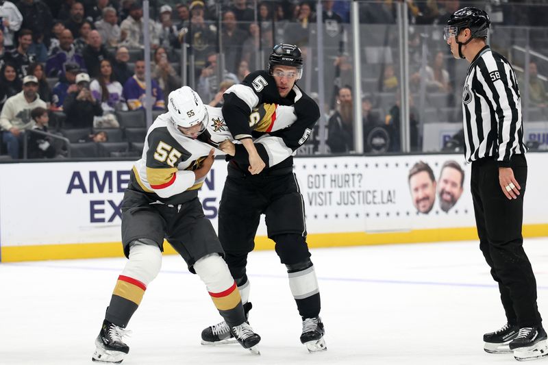 Oct 30, 2024; Los Angeles, California, USA;  Vegas Golden Knights right wing Keegan Kolesar (55) and Los Angeles Kings defenseman Andreas Englund (5) fight on the ice during the first period at Crypto.com Arena. Mandatory Credit: Kiyoshi Mio-Imagn Images