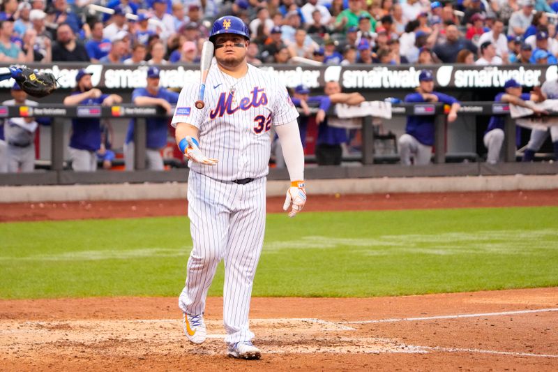 Jul 16, 2023; New York City, New York, USA; New York Mets designated hitter Daniel Vogelbach (32) reacts to striking out against the Los Angeles Dodgers during the sixth inning at Citi Field. Mandatory Credit: Gregory Fisher-USA TODAY Sports