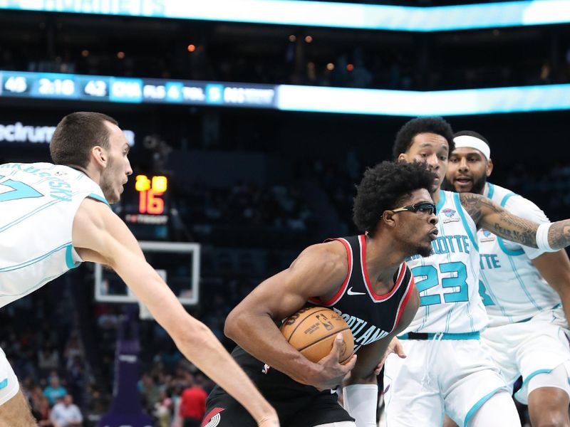 CHARLOTTE, NC - APRIL 3:  Scoot Henderson #00 of the Portland Trail Blazers drives to the basket during the game against the Charlotte Hornets on April 3, 2024 at Spectrum Center in Charlotte, North Carolina. NOTE TO USER: User expressly acknowledges and agrees that, by downloading and or using this photograph, User is consenting to the terms and conditions of the Getty Images License Agreement.  Mandatory Copyright Notice:  Copyright 2024 NBAE (Photo by Brock Williams-Smith/NBAE via Getty Images)