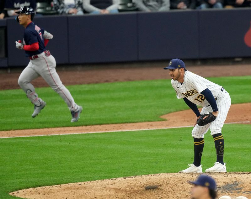 Apr 23, 2023; Milwaukee Brewers relief pitcher Javy Guerra (12) gives up a grand slam home run to Boston Red Sox left fielder Masataka Yoshida (7) during the eighth inning of their game at American Family Field. Mandatory Credit: Mark Hoffman-USA TODAY Sports