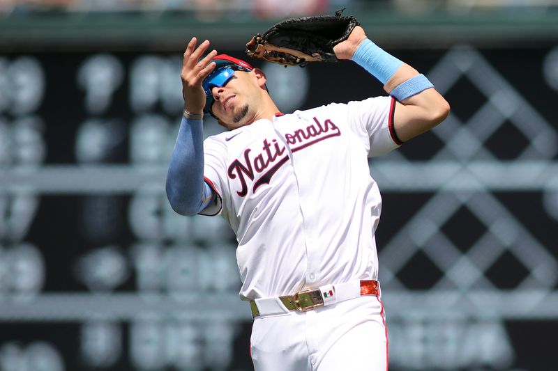 Jun 16, 2024; Washington, District of Columbia, USA; Washington Nationals first base Joey Meneses (45) makes a catch for an out during the third inning in a game against the Miami Marlins at Nationals Park. Mandatory Credit: Daniel Kucin Jr.-USA TODAY Sports