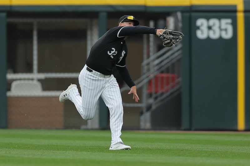 Apr 17, 2024; Chicago, Illinois, USA; Chicago White Sox outfielder Gavin Sheets (32) makes a catch in the first inning during game two of a double header against the Kansas City Royals at Guaranteed Rate Field. Mandatory Credit: Melissa Tamez-USA TODAY Sports