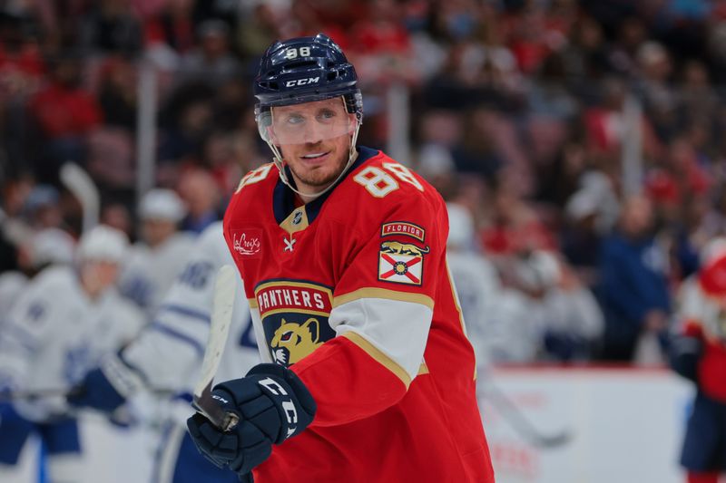 Nov 27, 2024; Sunrise, Florida, USA; Florida Panthers defenseman Nate Schmidt (88) looks on against the Toronto Maple Leafs during the second period at Amerant Bank Arena. Mandatory Credit: Sam Navarro-Imagn Images