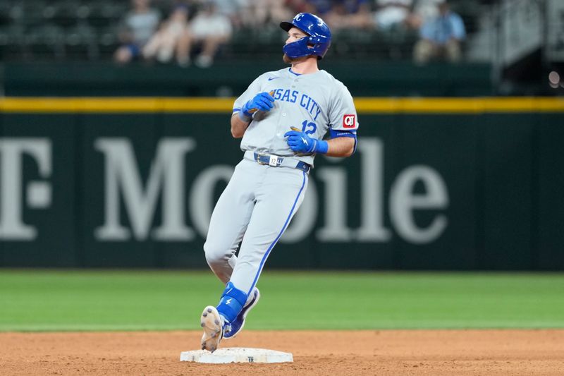 Jun 21, 2024; Arlington, Texas, USA; Kansas City Royals second baseman Nick Loftin (12) arrives to second base on his double against the Texas Rangers during the ninth inning at Globe Life Field. Mandatory Credit: Jim Cowsert-USA TODAY Sports