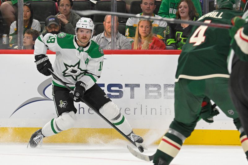 Sep 29, 2024; Saint Paul, Minnesota, USA;  Dallas Stars forward Sam Steel (18) looks to pass against the Minnesota Wild during the first period at Xcel Energy Center. Mandatory Credit: Nick Wosika-Imagn Images