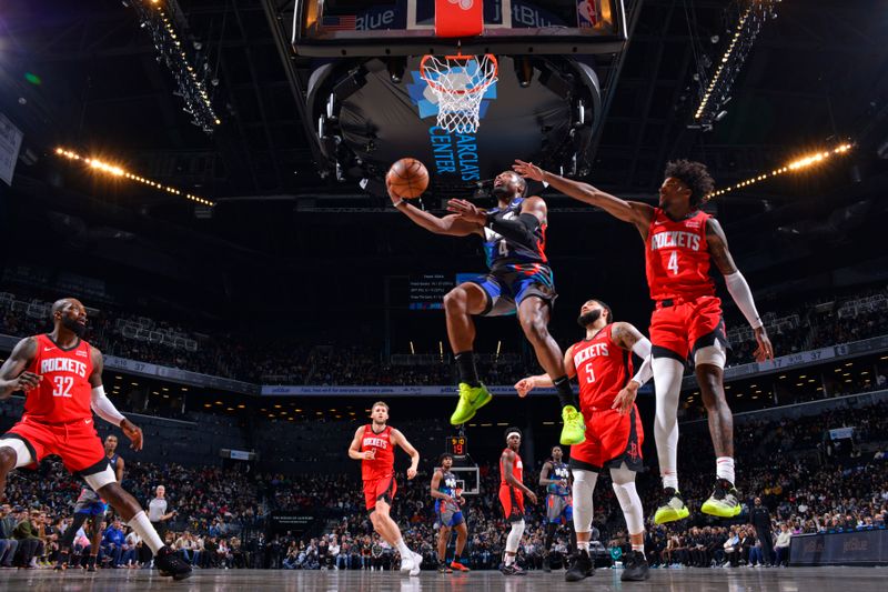 BROOKLYN, NY - JANUARY 27: Dennis Smith Jr. #4 of the Brooklyn Nets drives to the basket during the game against the Houston Rockets on January 27, 2024 at Barclays Center in Brooklyn, New York. NOTE TO USER: User expressly acknowledges and agrees that, by downloading and or using this Photograph, user is consenting to the terms and conditions of the Getty Images License Agreement. Mandatory Copyright Notice: Copyright 2024 NBAE (Photo by Jesse D. Garrabrant/NBAE via Getty Images)