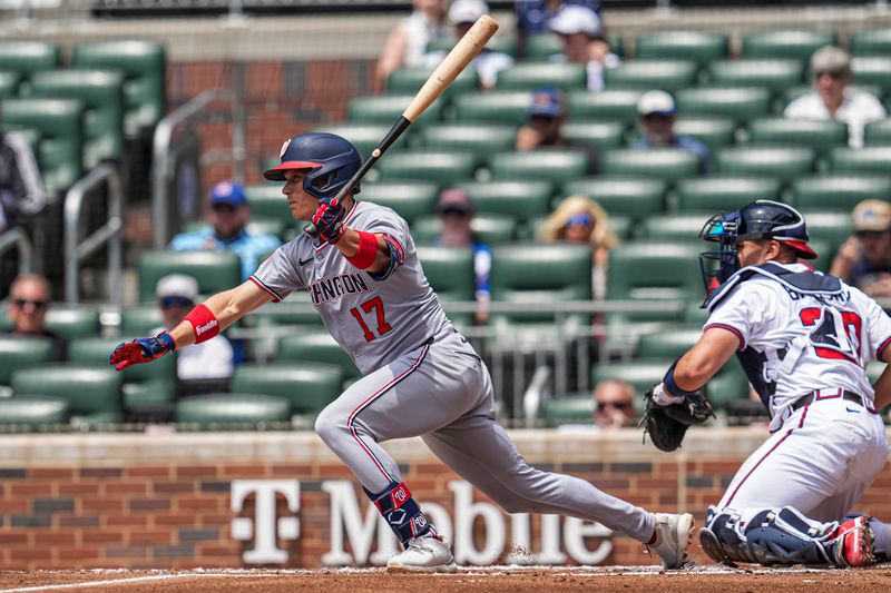 May 15, 2025; Cumberland, Georgia, USA; Washington Nationals outfielder Alex Call (17) hits a double against the Atlanta Braves during the second inning at Truist Park. Mandatory Credit: Dale Zanine-Imagn Images