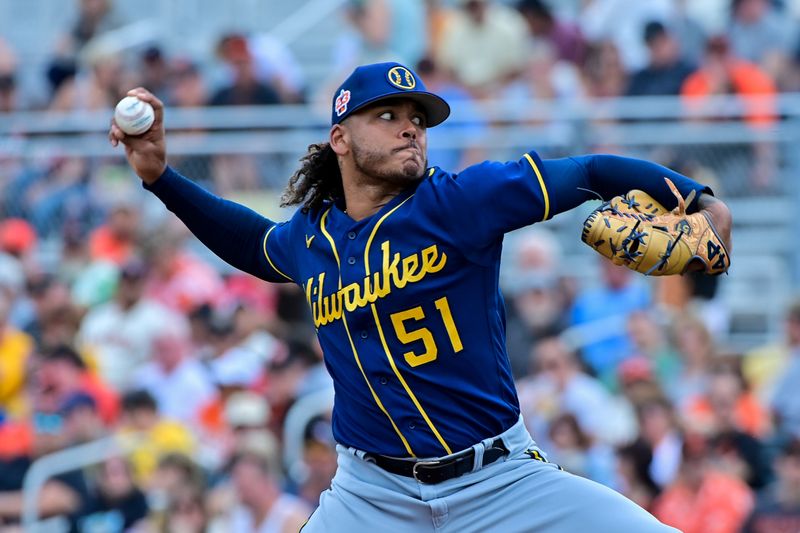 Mar 9, 2023; Scottsdale, Arizona, USA;  Milwaukee Brewers starting pitcher Freddy Peralta (51) throws in the first inning against the San Francisco Giants during a Spring Training game at Scottsdale Stadium. Mandatory Credit: Matt Kartozian-USA TODAY Sports