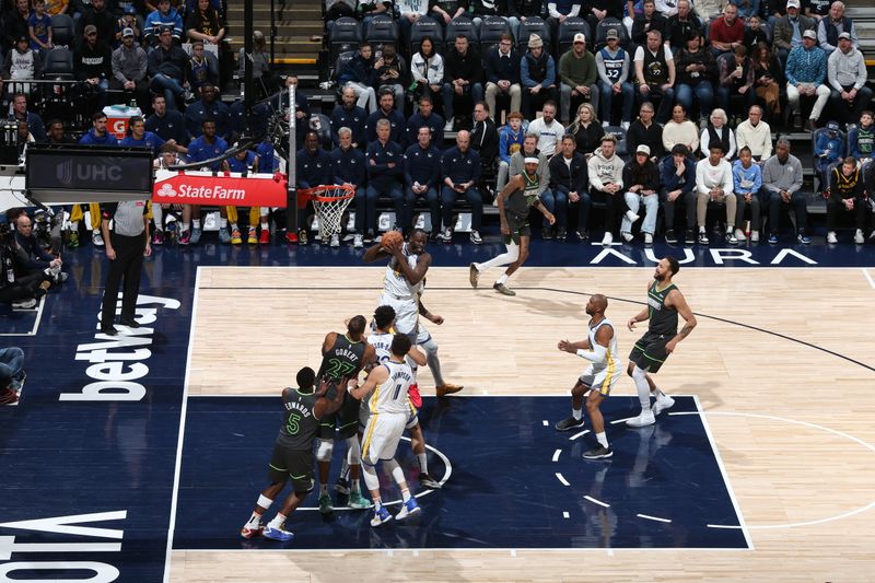 MINNEAPOLIS, MN -  MARCH 24: Draymond Green #23 of the Golden State Warriors goes up for the rebound during the game against the Minnesota Timberwolves on March 24, 2024 at Target Center in Minneapolis, Minnesota. NOTE TO USER: User expressly acknowledges and agrees that, by downloading and or using this Photograph, user is consenting to the terms and conditions of the Getty Images License Agreement. Mandatory Copyright Notice: Copyright 2024 NBAE (Photo by David Sherman/NBAE via Getty Images)