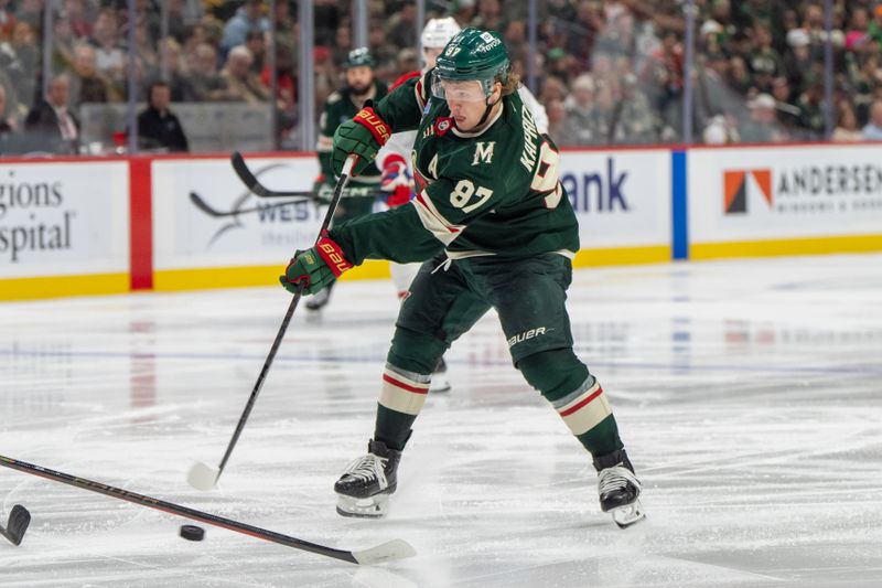 Nov 14, 2024; Saint Paul, Minnesota, USA; Minnesota Wild left wing Kirill Kaprizov (97) shoots against the Montreal Canadiens in the second period at Xcel Energy Center. Mandatory Credit: Matt Blewett-Imagn Images