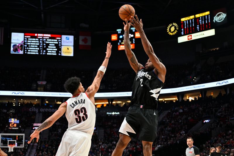 PORTLAND, OREGON - MARCH 22: Kawhi Leonard #2 of the LA Clippers shoots over Toumani Camara #33 of the Portland Trail Blazers during the second quarter of the game at the Moda Center on March 22, 2024 in Portland, Oregon. The LA Clippers won 125-117. NOTE TO USER: User expressly acknowledges and agrees that, by downloading and or using this photograph, User is consenting to the terms and conditions of the Getty Images License Agreement. (Photo by Alika Jenner/Getty Images)