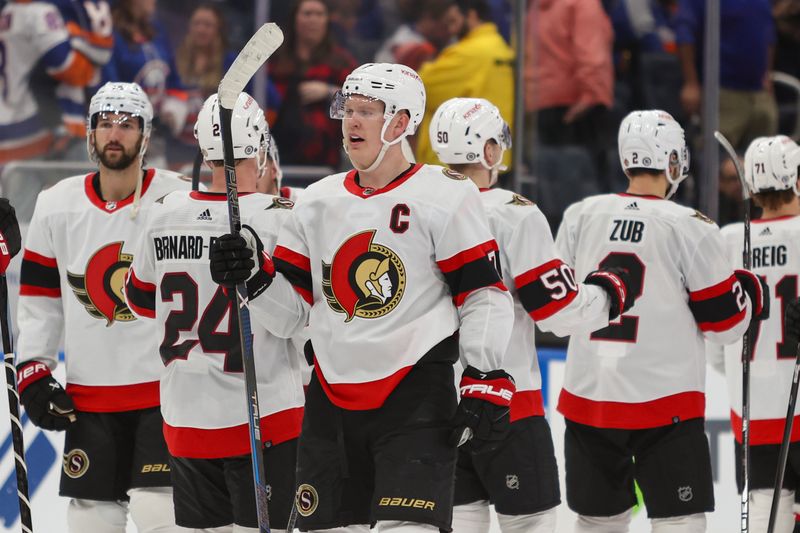 Mar 16, 2024; Elmont, New York, USA;  Ottawa Senators left wing Brady Tkachuk (7) scored the winning goal to beat the New York Islanders in overtime at UBS Arena. Mandatory Credit: Thomas Salus-USA TODAY Sports