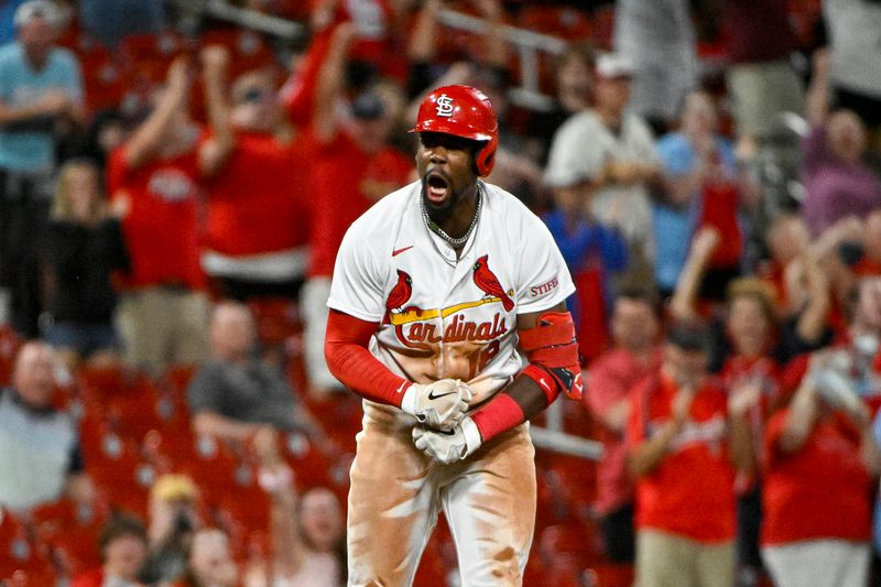 Aug 14, 2023; St. Louis, Missouri, USA;  St. Louis Cardinals right fielder Jordan Walker (18) reacts after hitting a three run triple against the Oakland Athletics during the seventh inning at Busch Stadium. Mandatory Credit: Jeff Curry-USA TODAY Sports