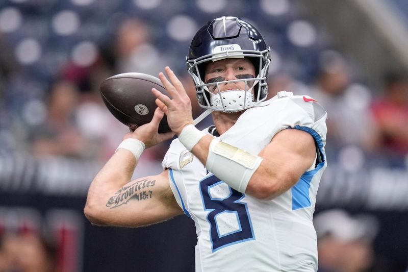 Tennessee Titans quarterback Will Levis (8) warms up before an NFL football game against the Houston Texans, Sunday, Nov. 24, 2024, in Houston. (AP Photo/Eric Christian Smith)