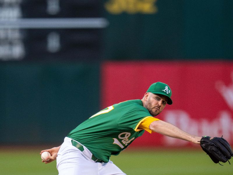 Apr 30, 2024; Oakland, California, USA;  Oakland Athletics pitcher Alex Wood (57) delivers a pitch against the Pittsburgh Pirates during the first inning at Oakland-Alameda County Coliseum. Mandatory Credit: Neville E. Guard-USA TODAY Sports