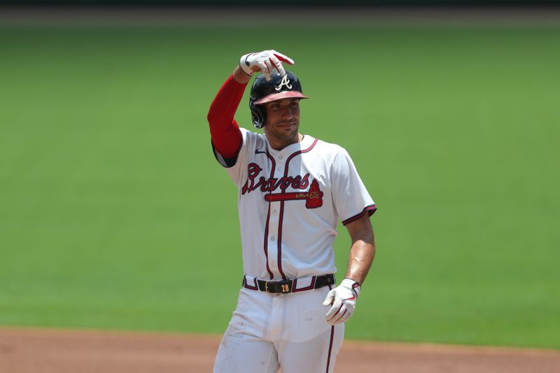 Jun 29, 2025; Cumberland, Georgia, USA; Atlanta Braves first baseman Matt Olson (28) reacts to his single during a game against the Philadelphia Phillies during the first inning at Truist Park. Mandatory Credit: Mady Mertens-Imagn Images