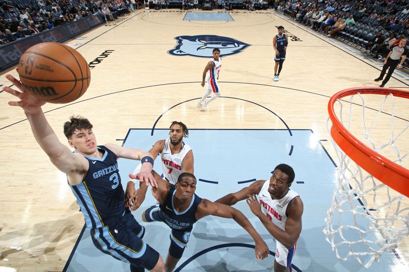 MEMPHIS, TN - APRIL 5: Jake LaRavia #3 of the Memphis Grizzlies drives to the basket during the game against the Detroit Pistons on April 5, 2024 at FedExForum in Memphis, Tennessee. NOTE TO USER: User expressly acknowledges and agrees that, by downloading and or using this photograph, User is consenting to the terms and conditions of the Getty Images License Agreement. Mandatory Copyright Notice: Copyright 2024 NBAE (Photo by Joe Murphy/NBAE via Getty Images)